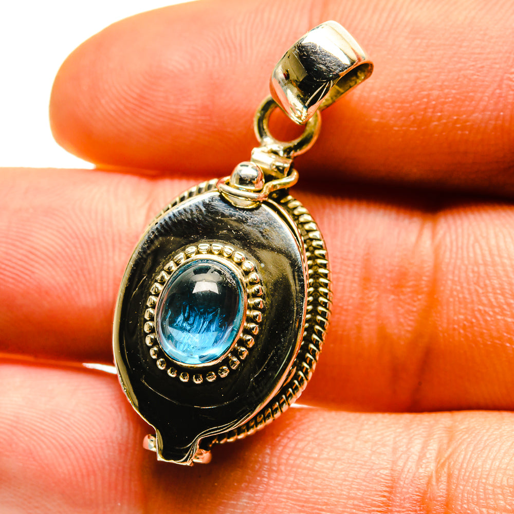 925 sterling silver pendant with blue fluorite oval cabochon, scalloped halo bezel