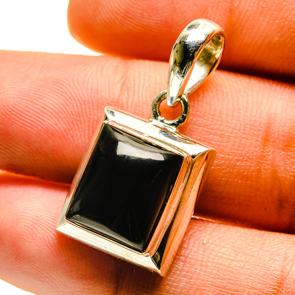 Black onyx pendant with square silver bezel and top loop bail