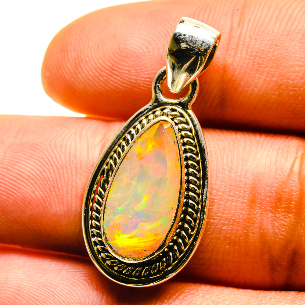 925 sterling silver opal teardrop pendant with faceted Ethiopian opal cabochon