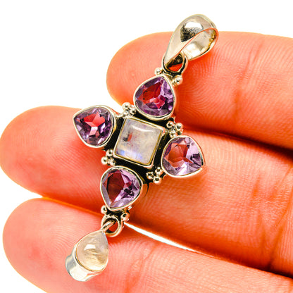 Amethyst pendant with purple gemstones and iridescent moonstone, square center stone in silver