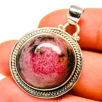 Rhodonite pendant in oval bezel with rope border, 925 sterling silver bail