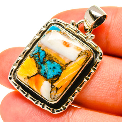 Sterling silver turquoise-copper pendant, rectangular stone in black bezel
