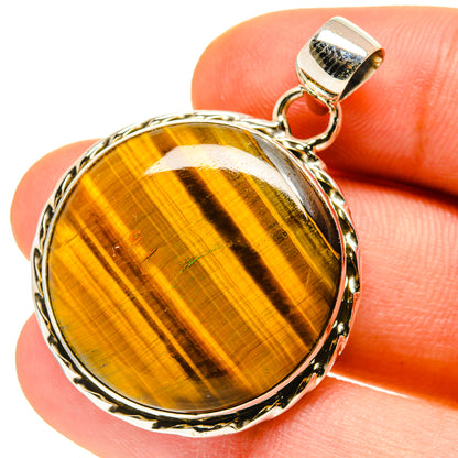Tiger eye pendant in oval 925 sterling silver setting, with top bail and loop