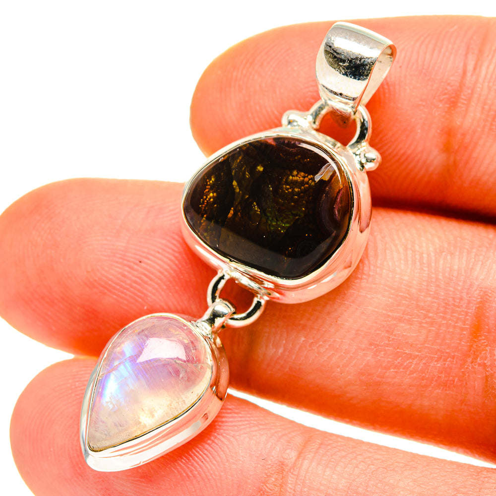 Sterling silver pendant with dark amber fire agate and opalescent moonstone teardrop stones