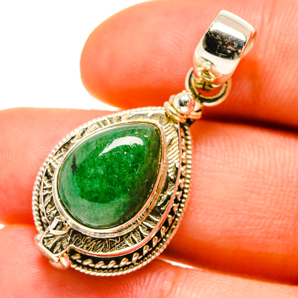Maw Sit Sit poison pendant close-up: 925 silver bail, green teardrop stone in ornate frame