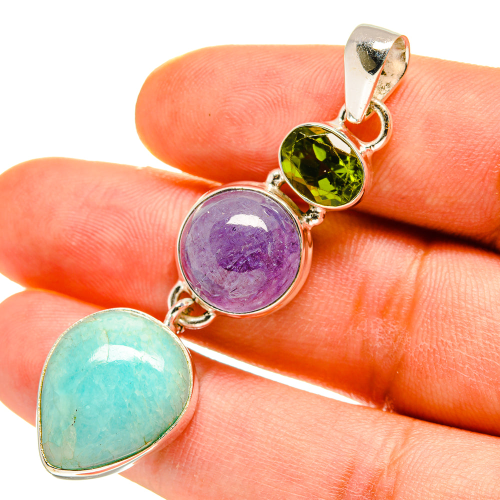 Three-stone oval pendant in 925 sterling silver with teal, purple, and green gemstones