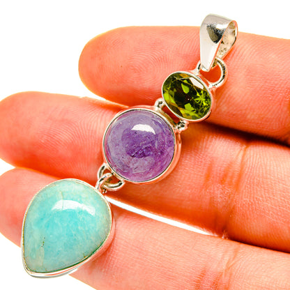 Three-stone oval pendant in 925 sterling silver with teal, purple, and green gemstones