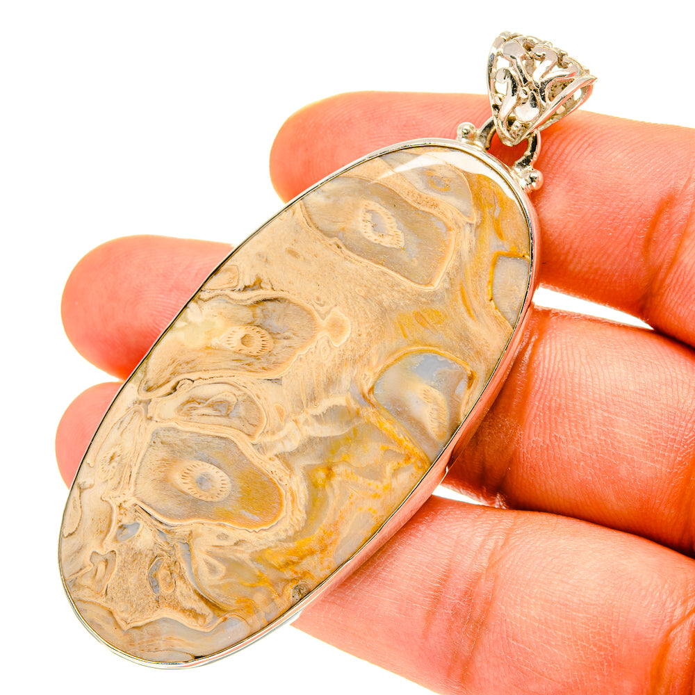 Oval amber lace agate pendant in 925 sterling silver with ornate bail