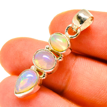 Gold-tone 925 opal pendant with mixed-shape iridescent Ethiopian stones