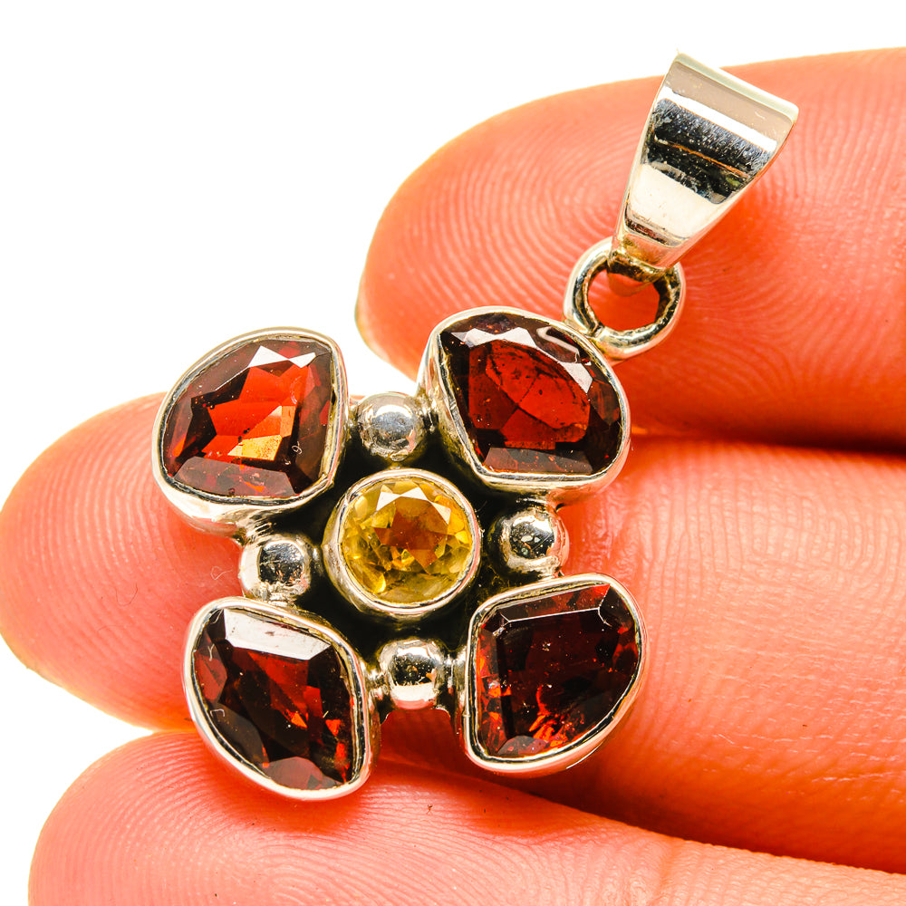 Garnet and citrine pendant in sterling silver with five gemstone flower setting