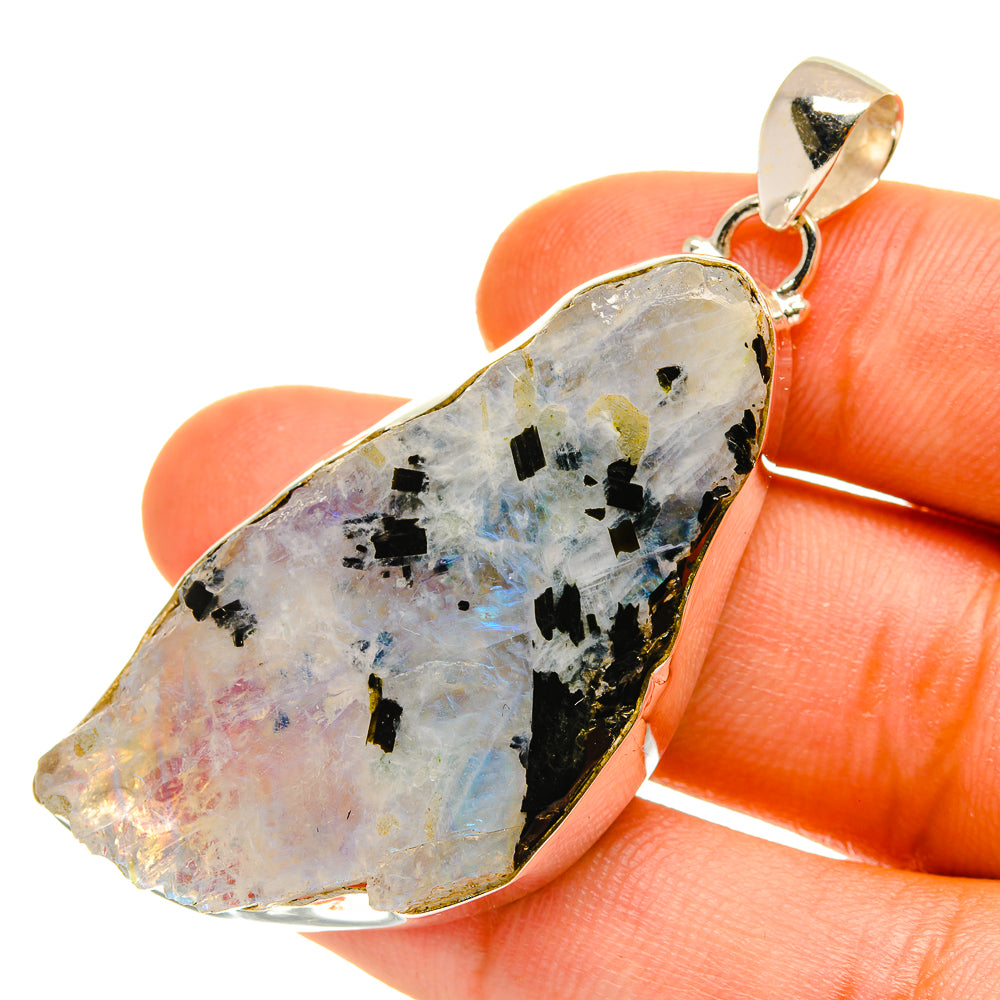 Sterling silver moonstone pendant, rough teardrop with black inclusions and iridescence