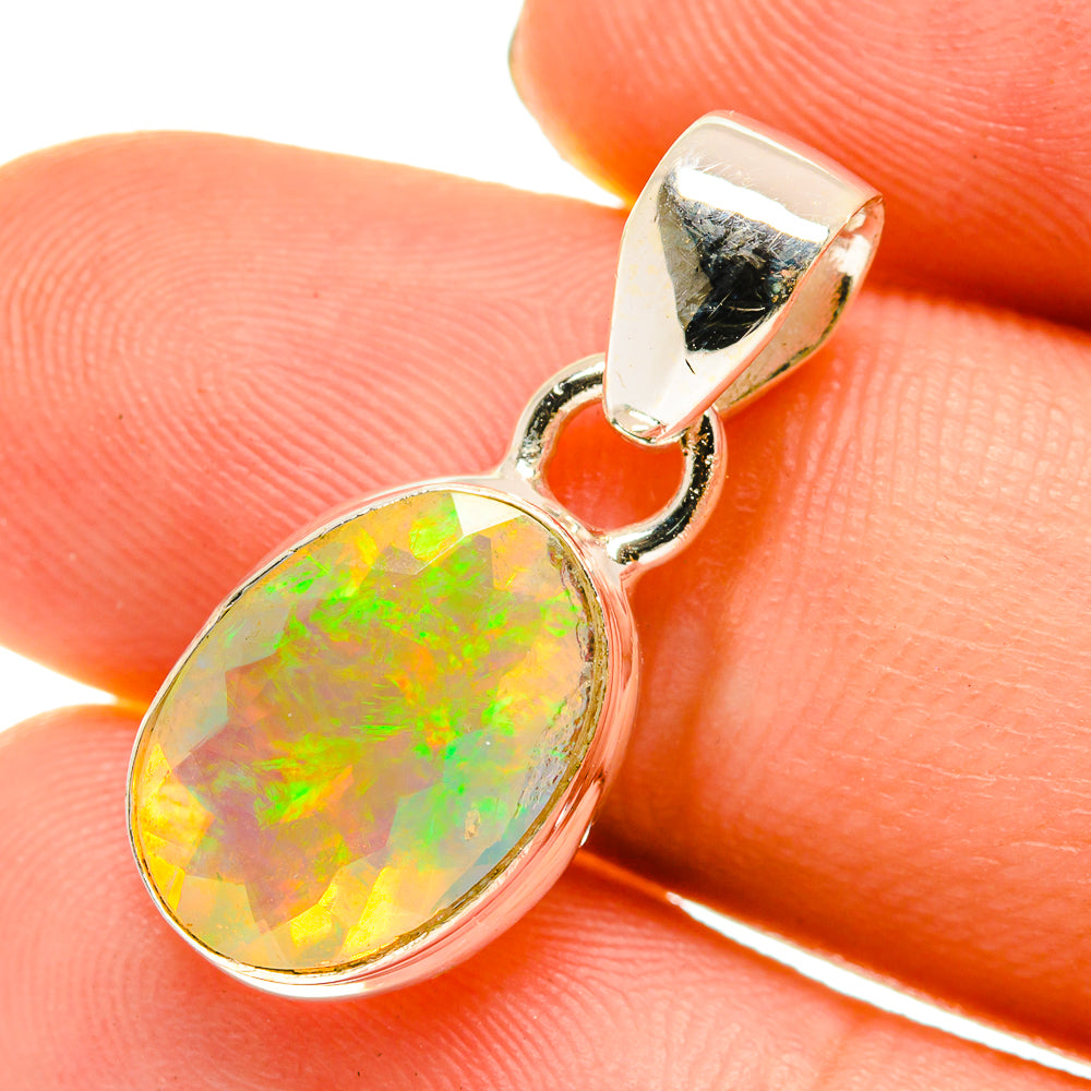 925 sterling silver oval opal pendant with faceted rainbow opal and curved bail