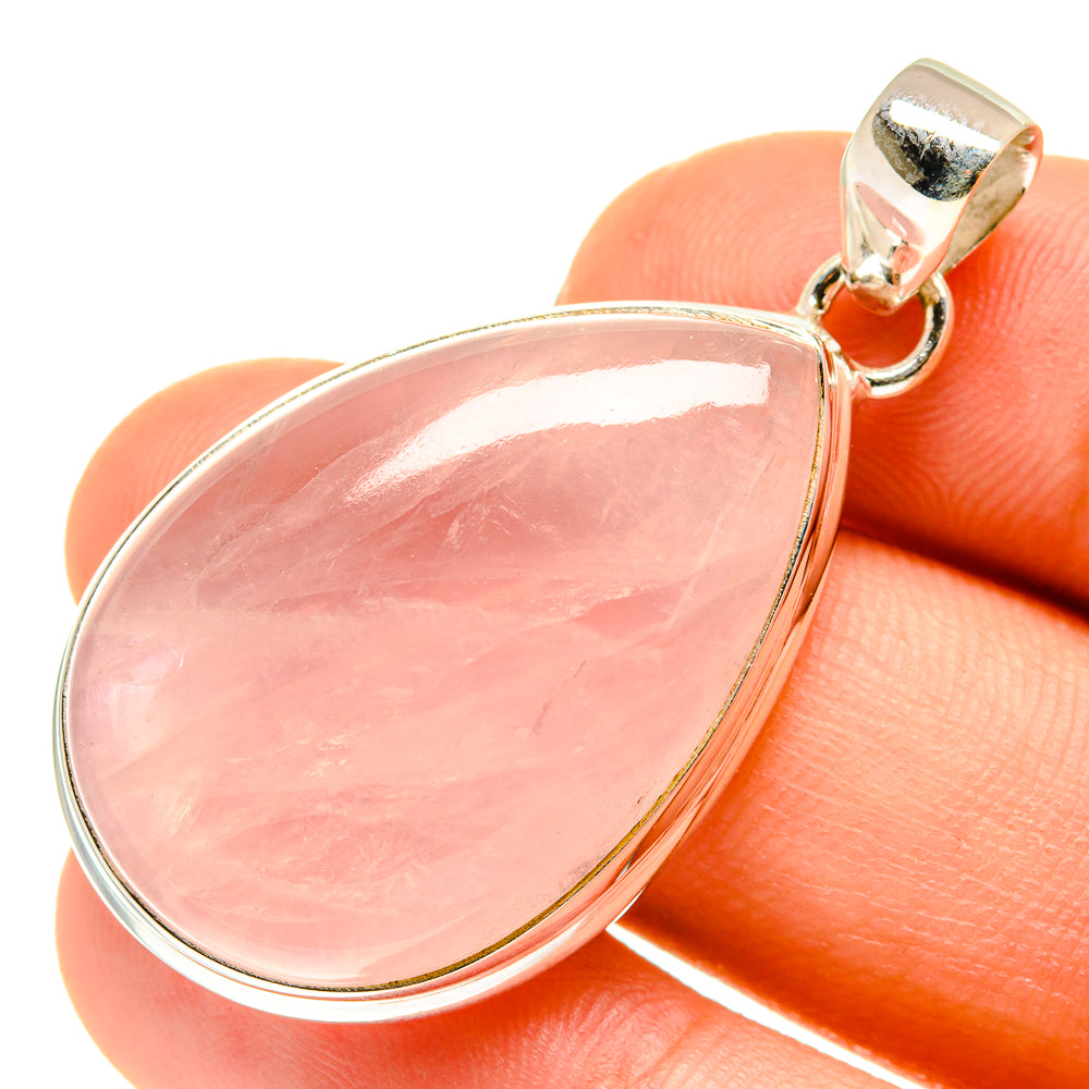 Teardrop rose quartz pendant in 925 sterling silver bezel with loop bail