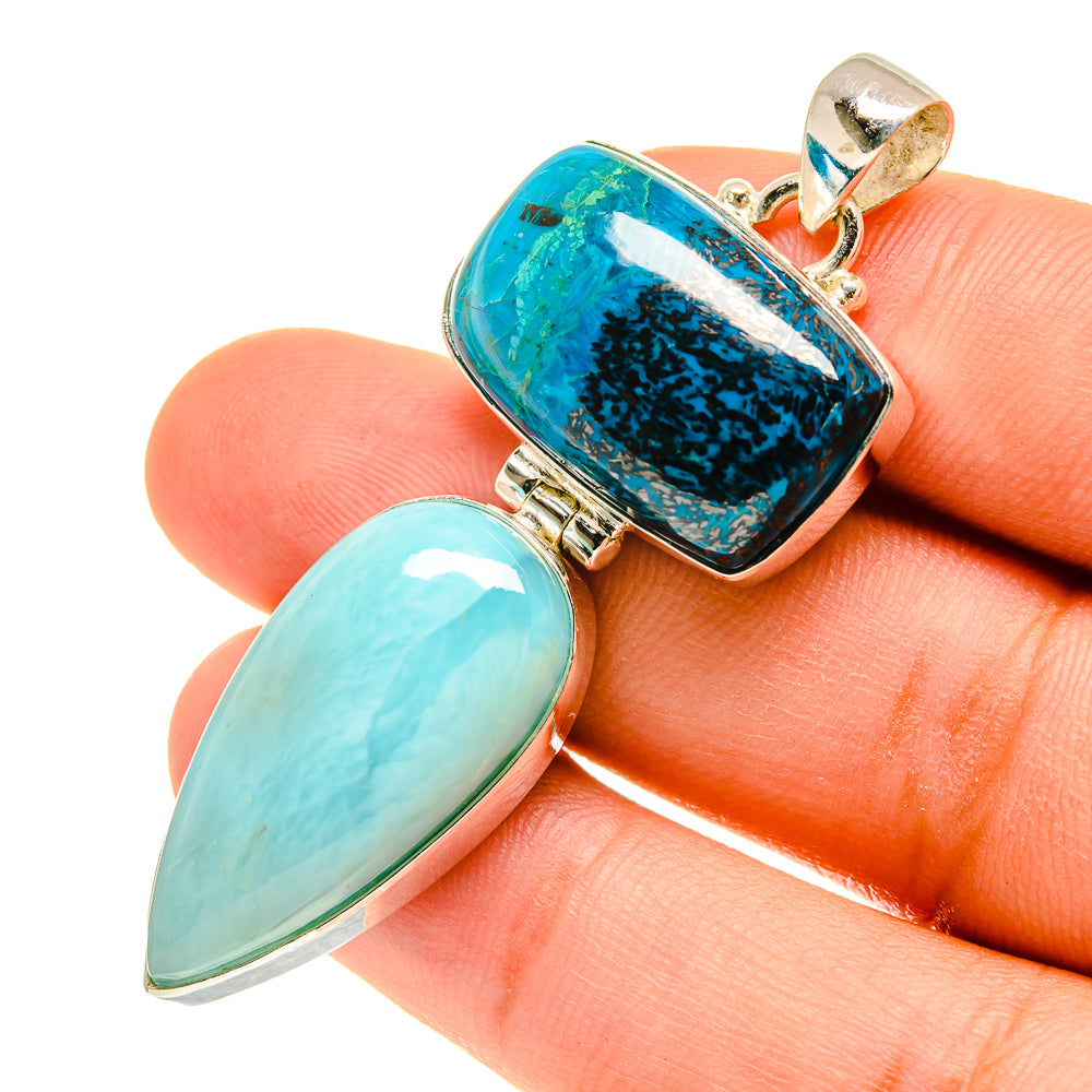 Sterling silver gemstone pendant with blue and turquoise oval stones in prong setting