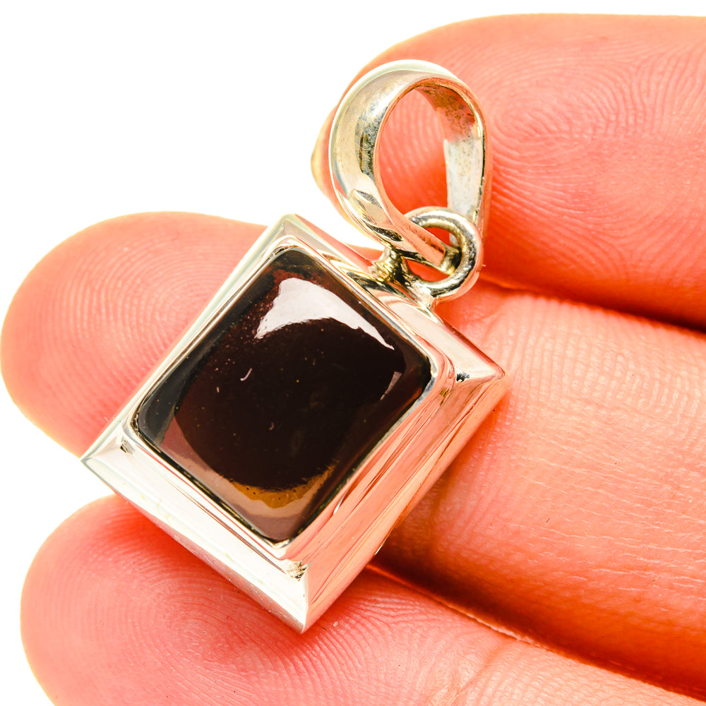 Square smoky quartz pendant in sterling silver with dark bezel and bale loop