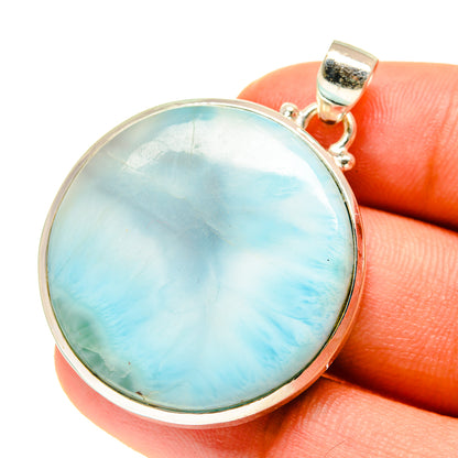 Round larimar pendant on 925 sterling silver bail, light blue cabochon in bezel