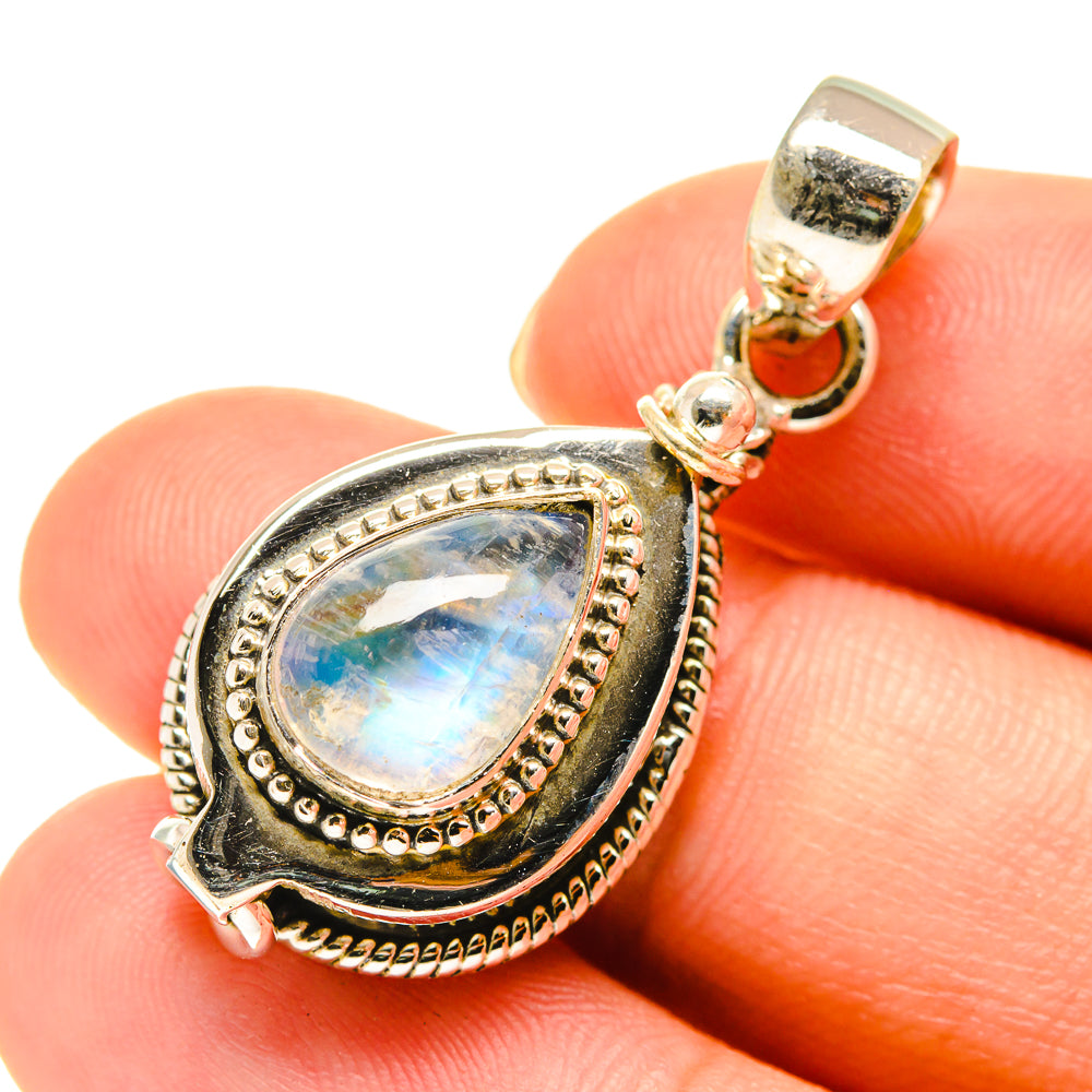 Rainbow moonstone teardrop pendant in 925 sterling silver, close-up with bail