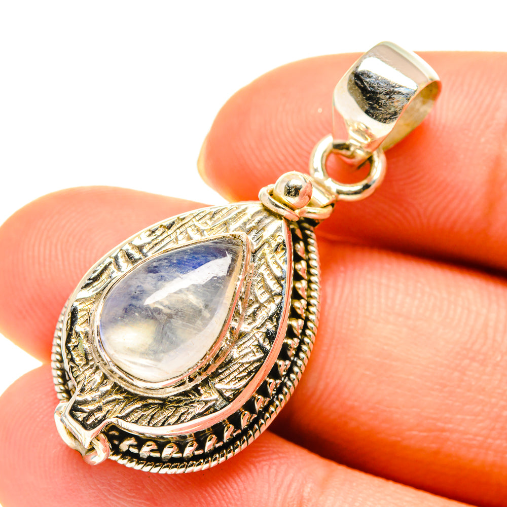 Teardrop moonstone pendant with 925 sterling silver bail and ornate bezel, blue-white stone