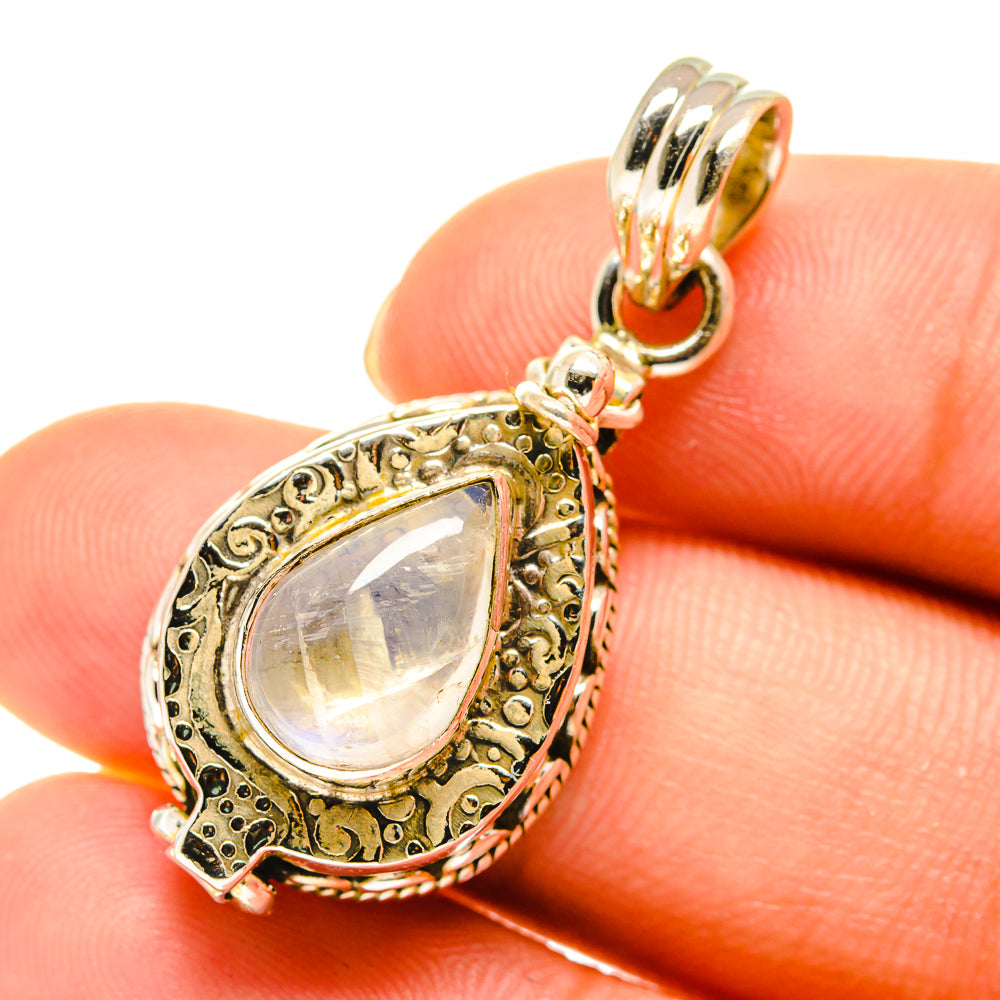 Teardrop moonstone pendant charm in 925 sterling silver with ornate bezel and ring bail