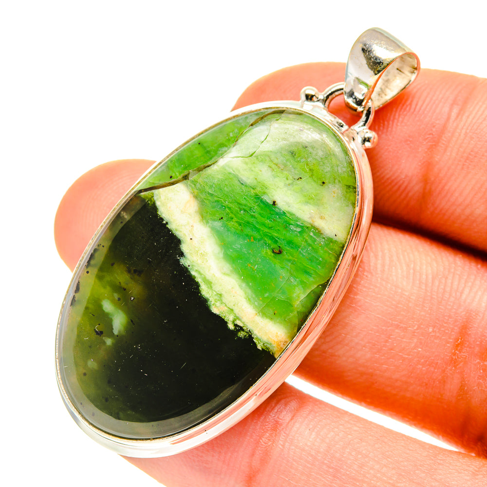 Green opal pendant in sterling silver bezel, teardrop shape with bail loop