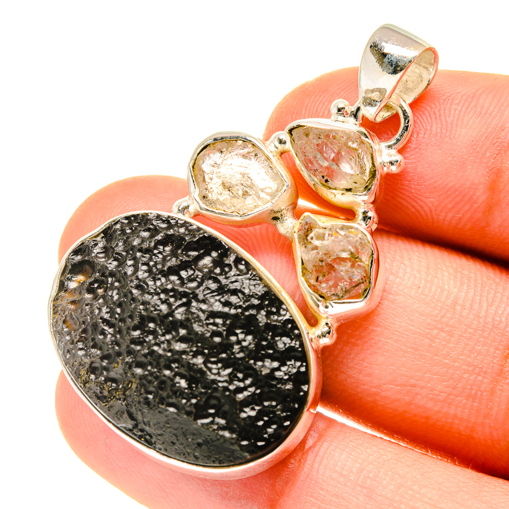 Tektite and Herkimer diamond pendant with three oval crystal stones, black tektite in silver bail