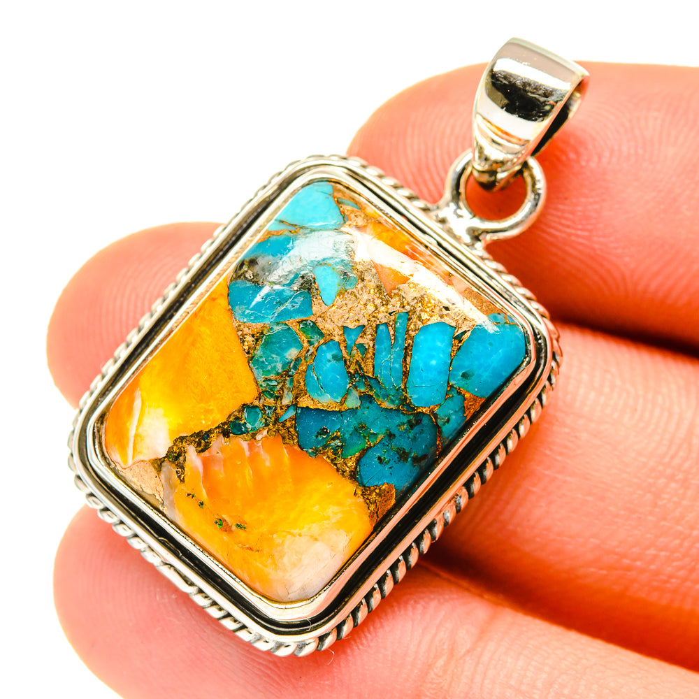 Sterling silver pendant with turquoise and orange composite stone, bail loop top