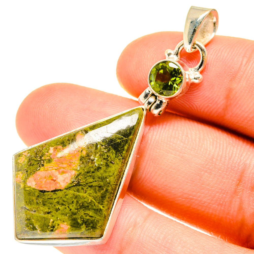 Sterling silver pendant with round green gemstone and marbled unakite teardrop charm