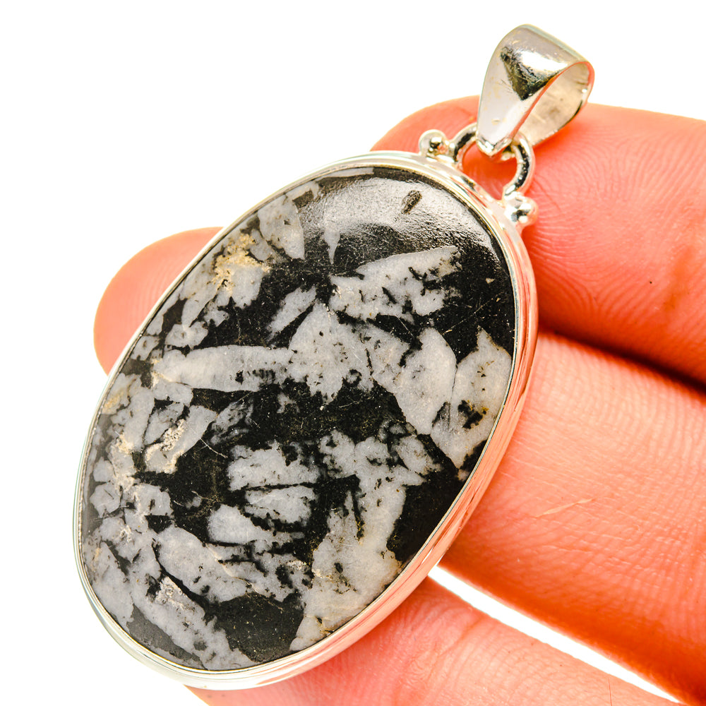 Oval chrysanthemum stone pendant with top bail, black-and-white speckled 925 silver
