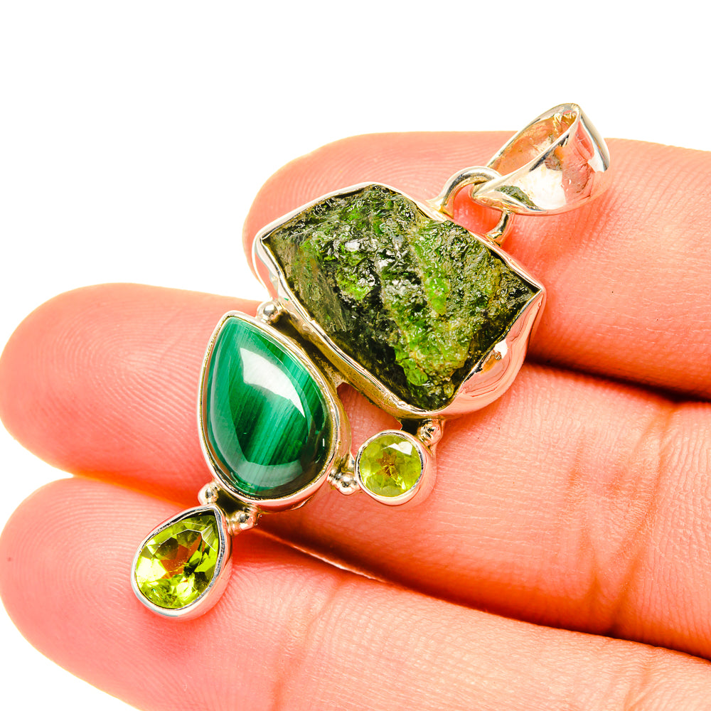 Sterling silver gemstone pendant with rough green center, malachite teardrop, and small rounds