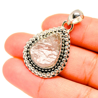 Rough pink rose quartz teardrop pendant in 925 sterling silver with ornate bezel