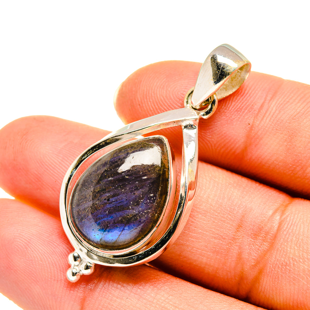Labradorite teardrop pendant in 925 sterling silver with dark blue iridescent stone