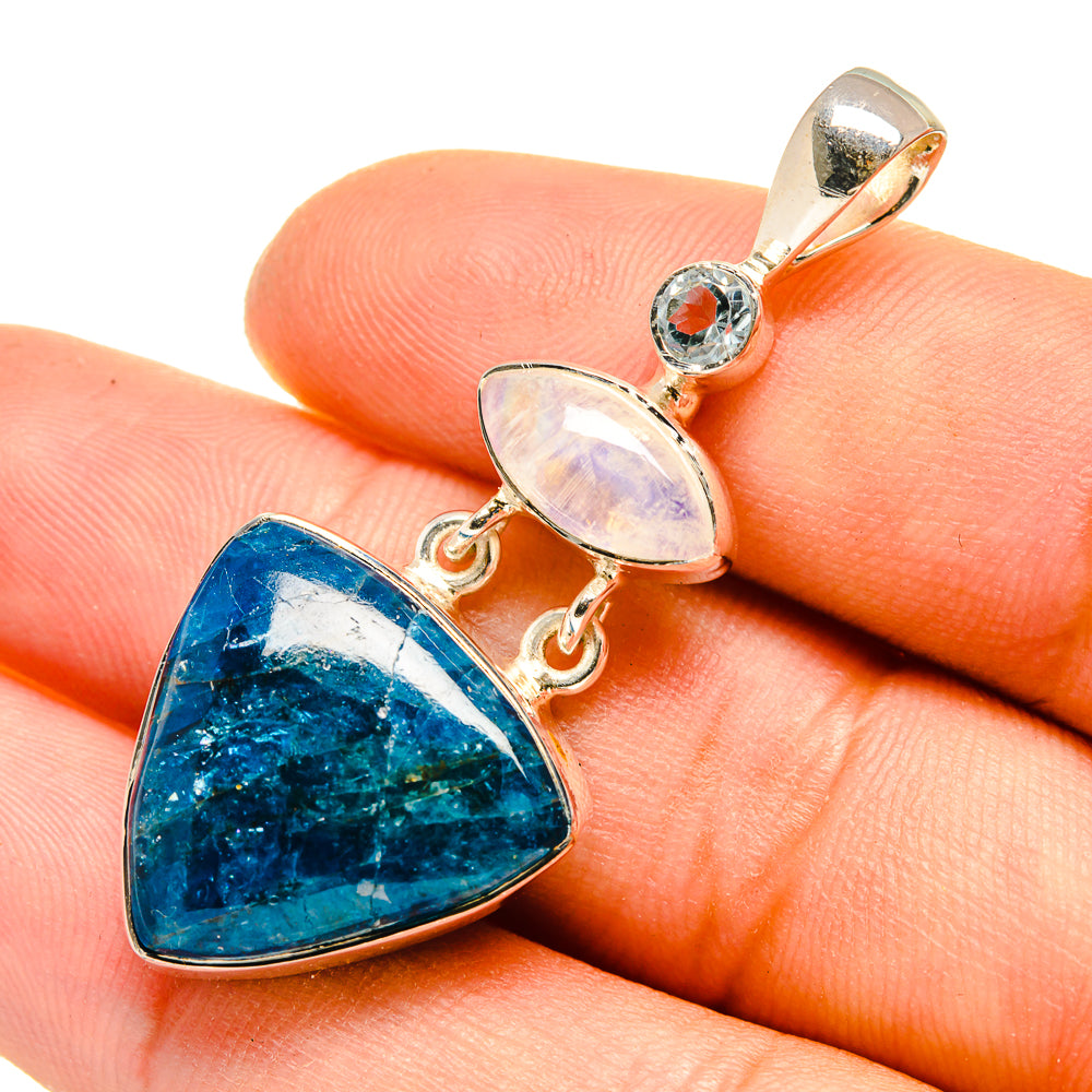 Sterling silver pendant with blue triangular gemstone, opal oval, and small round blue stone