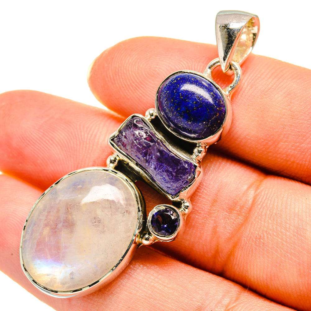 Sterling silver gemstone pendant with blue lapis oval, purple tanzanite rectangle, small round