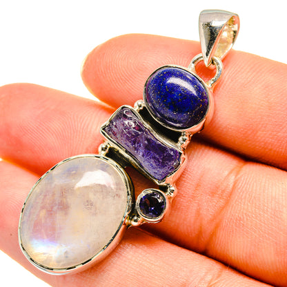 Sterling silver gemstone pendant with blue lapis oval, purple tanzanite rectangle, small round
