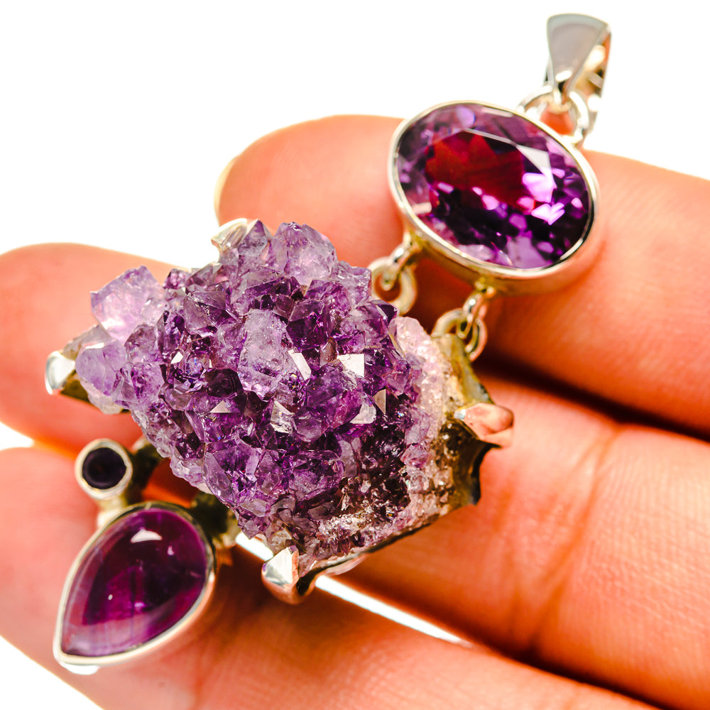 Amethyst crystal pendant with oval purple stone and rough amethyst cluster, with small round accents
