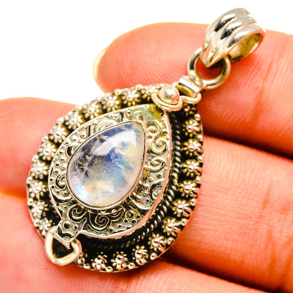 Teardrop moonstone pendant in 925 sterling silver with ornate halo and loop bail