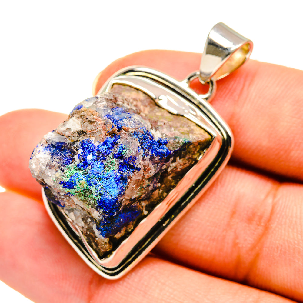 Sterling silver azurite pendant with rough blue stone, teardrop bezel close-up