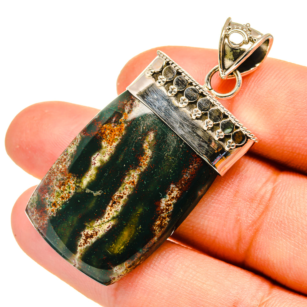 Bloodstone pendant in rectangular sterling silver setting with loop bail, green gemstone cabochon