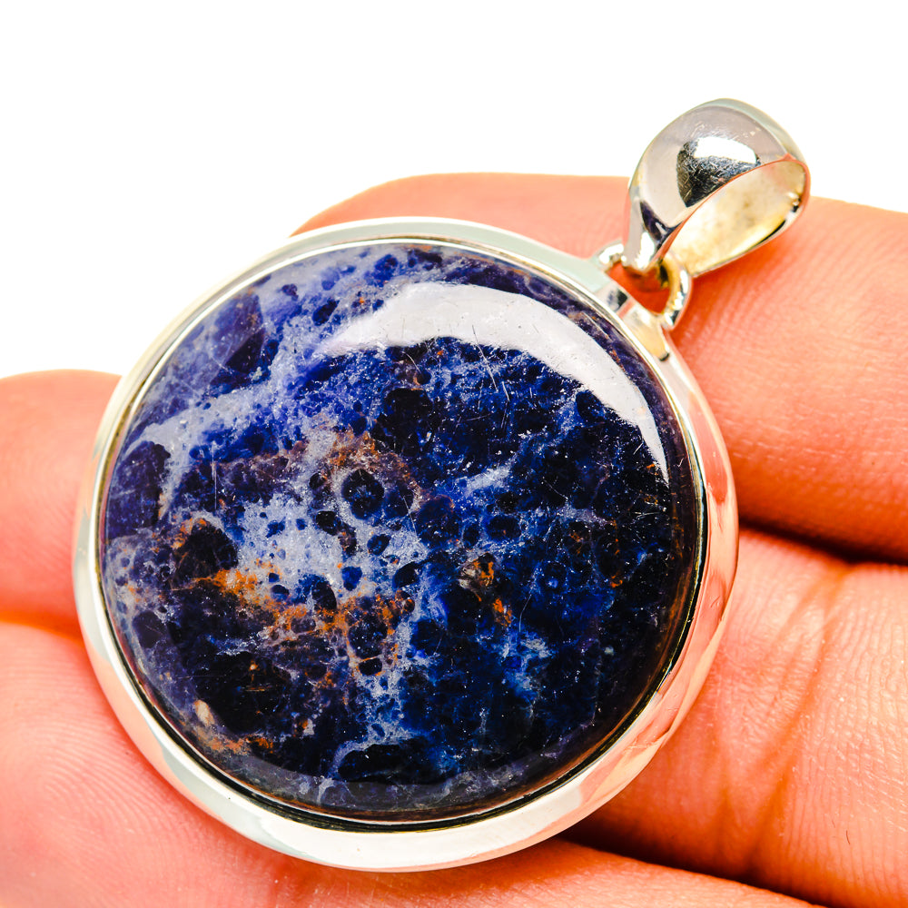 Round sodalite pendant with blue cabochon set in 925 sterling silver bezel and bail