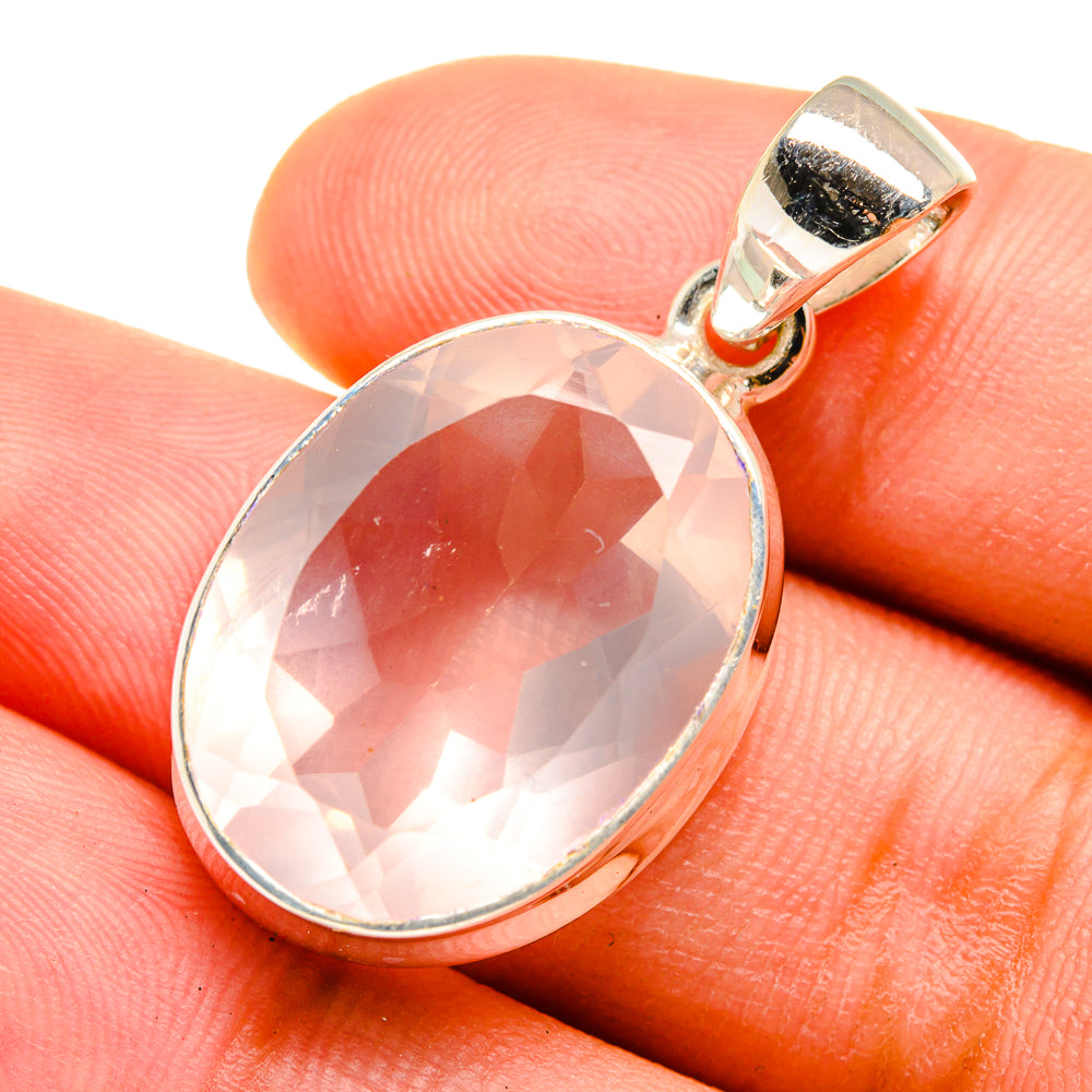 Oval rose quartz pendant in 925 sterling silver bezel with polished bail