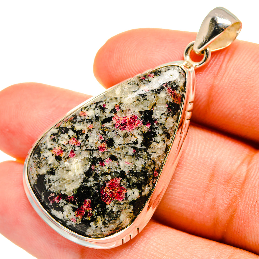 Teardrop eudialyte pendant with red-green speckled stone and 925 sterling frame
