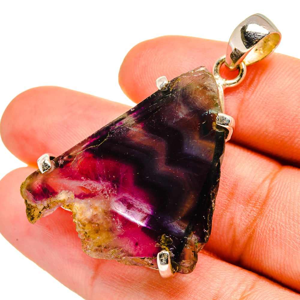 Fluorite pendant in 925 sterling silver with dark purple and red crystal, prong set