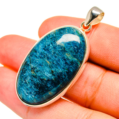 Shattuckite oval pendant with silver bezel and bail, blue-green stone cabochon