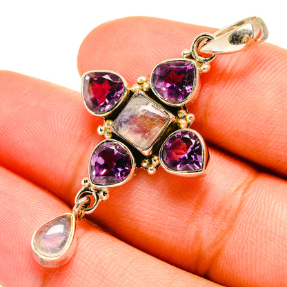 Amethyst and moonstone pendant detail with purple gemstones and teardrop moonstone charm