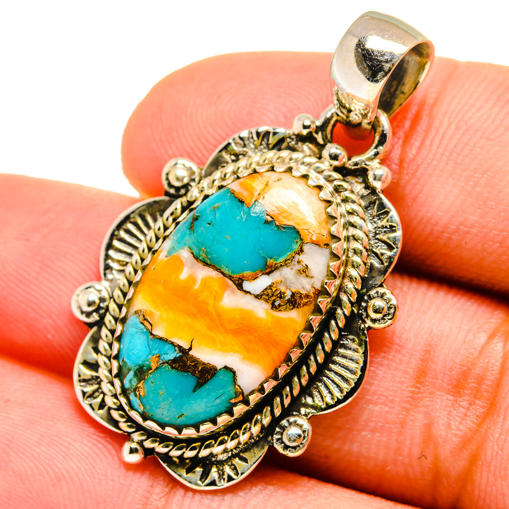 Turquoise and orange spiny oyster pendant in ornate sterling silver bezel with bail