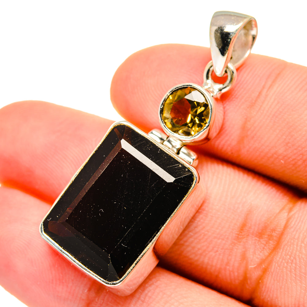 Sterling silver pendant with rectangular smoky quartz and round citrine stone setting