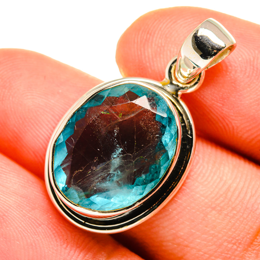 Blue fluorite pendant with oval teal stone in sterling silver bezel, close-up