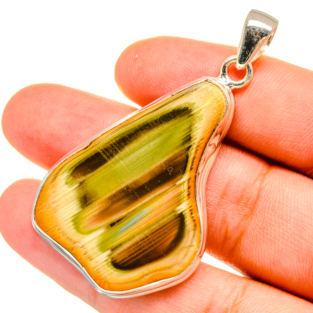 Jasper pendant with gold, green, and orange teardrop stone in silver setting and bail