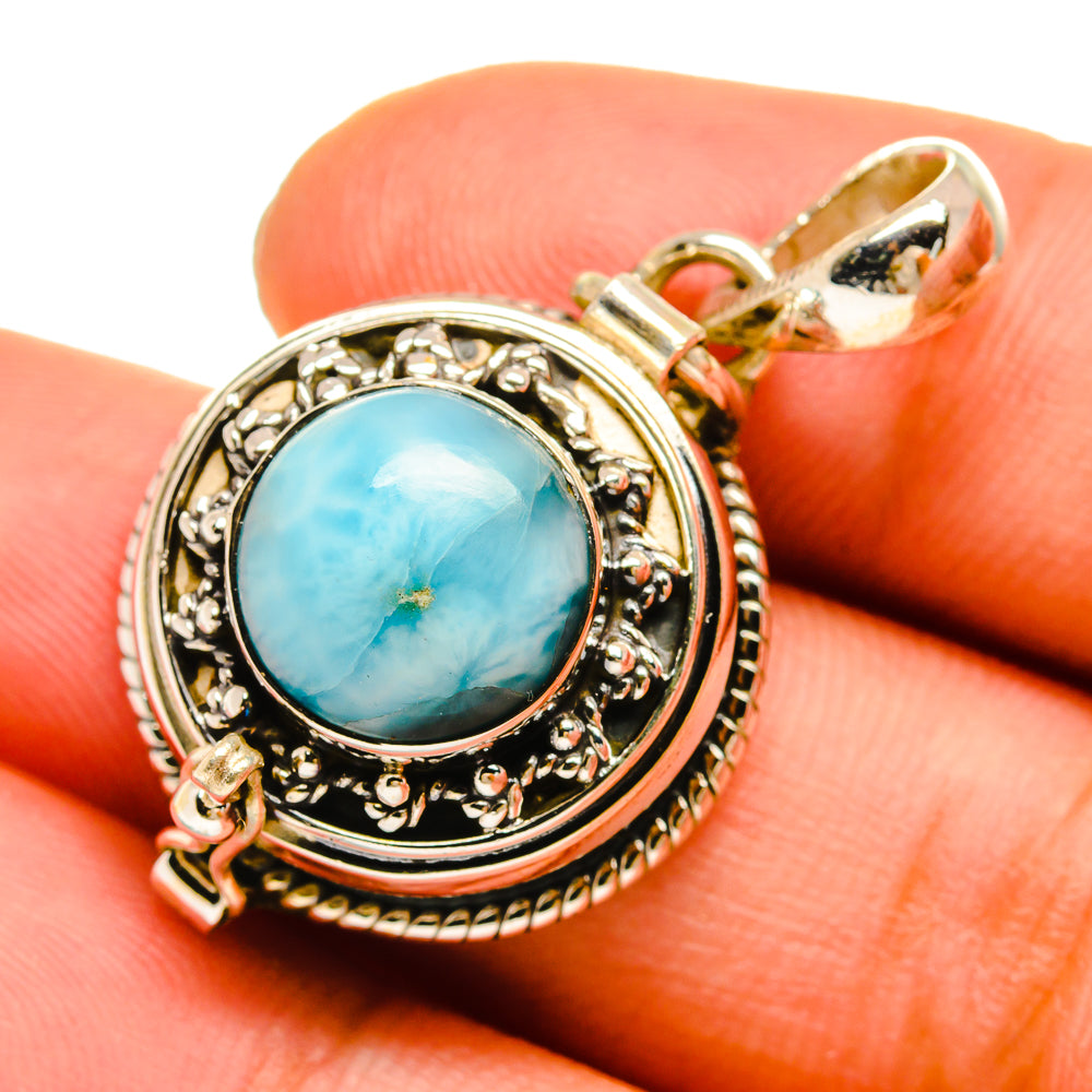 Sterling silver larimar pendant with round blue gemstone and ornate setting