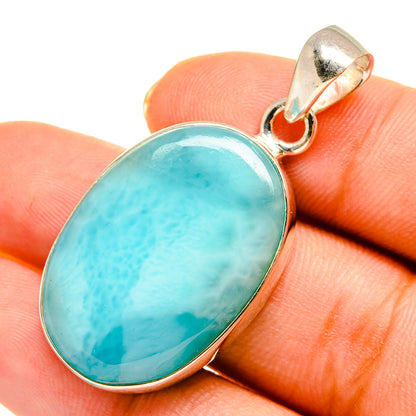 Larimar pendant with oval light-blue stone bezel in sterling silver setting